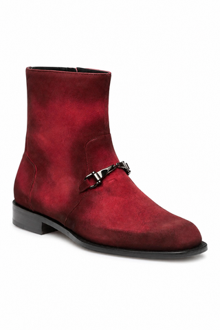 Wine-colored hand-painted suede ankle boot with a signature horse-bit detail and sleek leather sole.