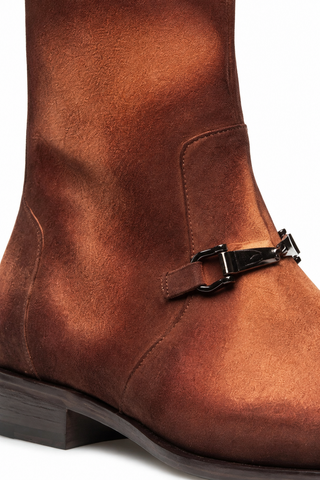 Mezlan Mystic men's brown suede ankle boot featuring a signature metallic horse-bit detail and leather sole.