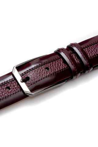 Burgundy Mezlan leather belt featuring textured deer-skin, smooth calf-skin accents, and a glossy silver buckle.