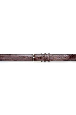 Brown genuine alligator skin belt with a polished silver buckle, handcrafted in Spain for a refined look.