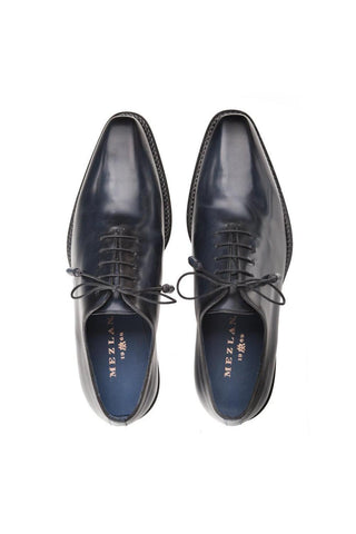 Mezlan Enterprise navy blue calfskin leather whole-cut Oxfords with contrast stitching and a sleek, plain-toe design.
