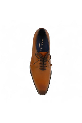 Cognac Mezlan Enterprise whole-cut oxford in smooth calfskin leather with a sleek plain toe and contrast stitching.