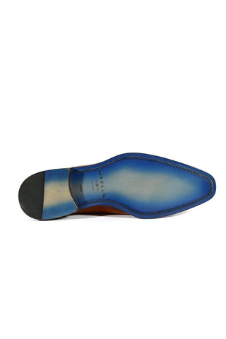 Bottom view of a Mezlan Enterprise Oxford shoe featuring a vibrant blue leather sole and durable stacked heel.