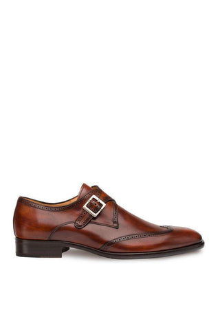 Cognac hand-burnished calf-skin leather wing-tip single monk-strap shoe with refined perforations.