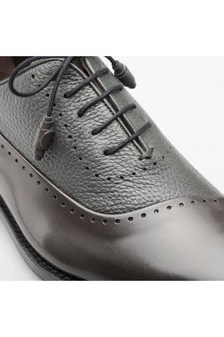 Mezlan Postdam oxford shoe in gray featuring a mix of smooth calfskin and textured deer leather with brogue detailing.