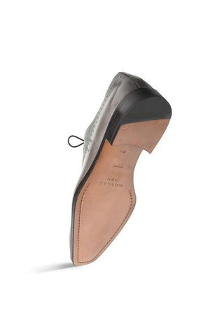 Mezlan Postdam black leather and deer-skin oxford shoe showing the durable stitched leather sole and heel.