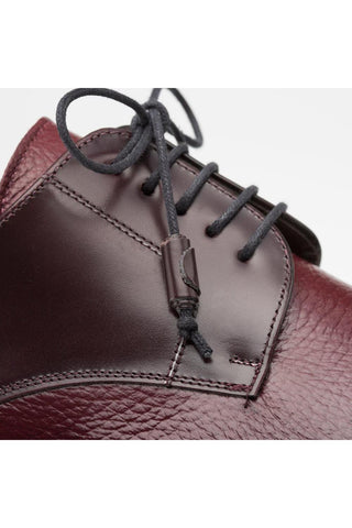 Burgundy Mezlan Soka derby shoe featuring premium textured deer-skin and smooth calf-skin leather with black laces.