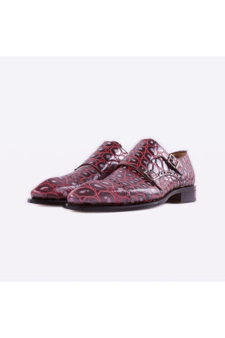 Burgundy monk-strap loafers in crocodile-embossed calfskin with silver buckles and a double leather sole.