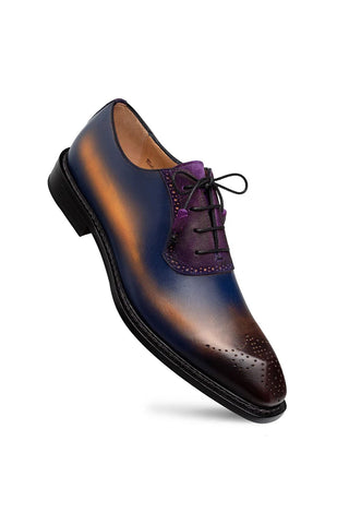 Mezlan Bretton multi-color leather and suede Oxford shoe with medallion toe detail and lace-up closure.