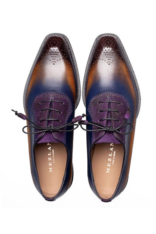 Mezlan Bretton multi-color suede and leather oxford shoes with medallion toe detail.