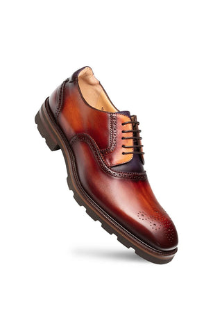 Mezlan Birch hand-painted cognac and purple leather derby shoe with medallion toe detailing and a lugged sole.