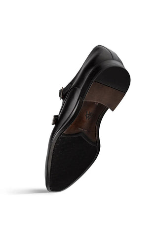 Black Mezlan Berkshire leather double monk-strap shoe showing the textured leather sole and heel.